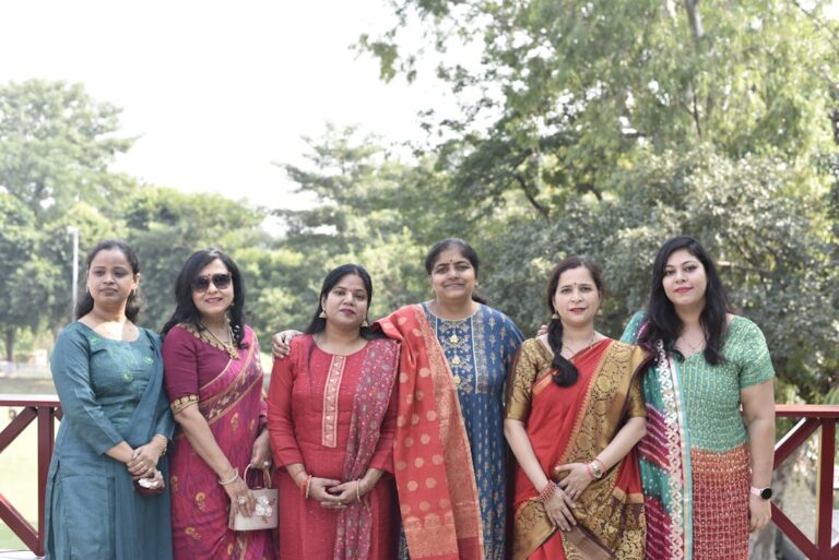 a group of women standing next to each other