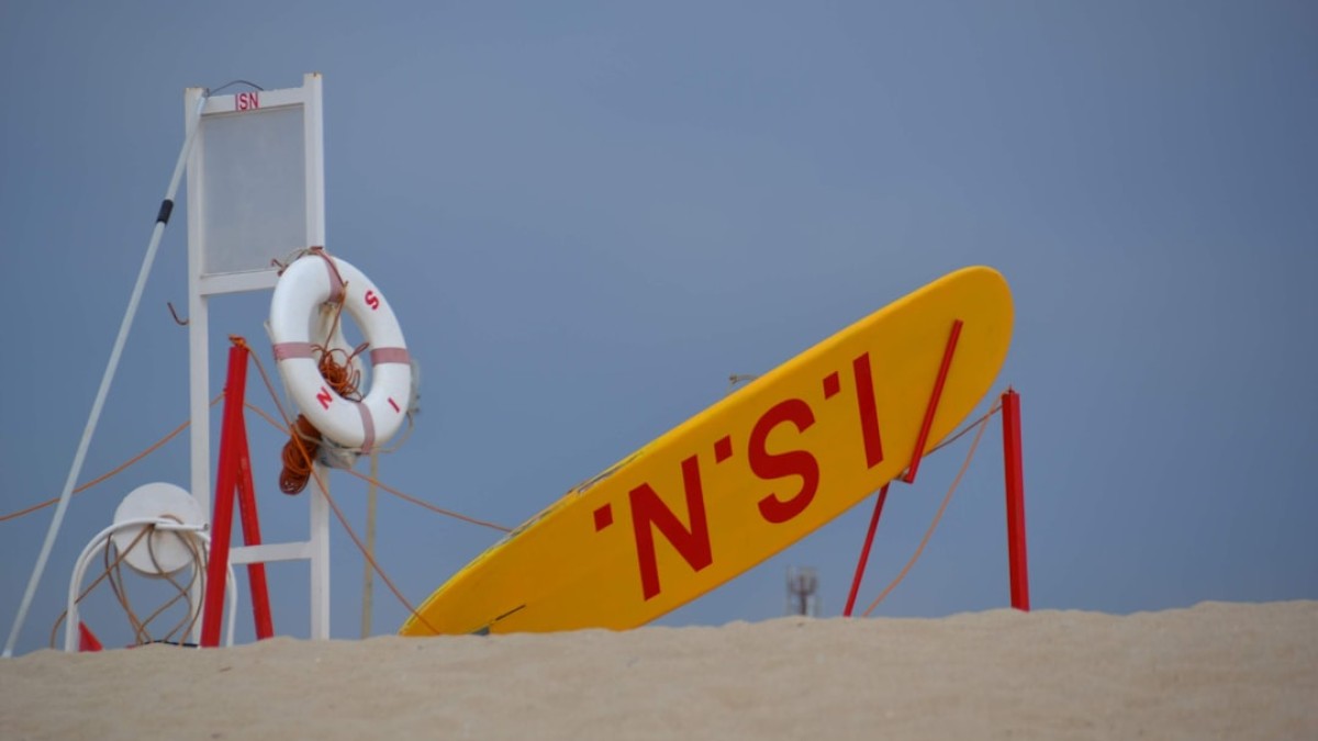 a life preserver and a life preserver on a beach
