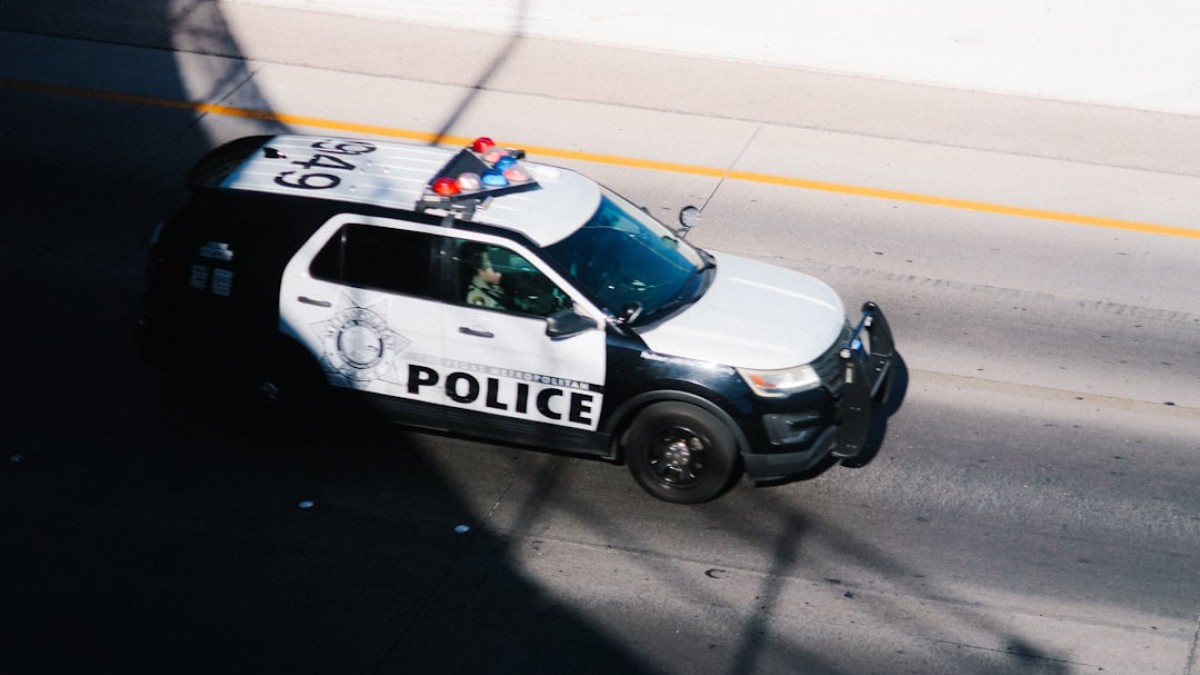 a police car parked on the side of the road