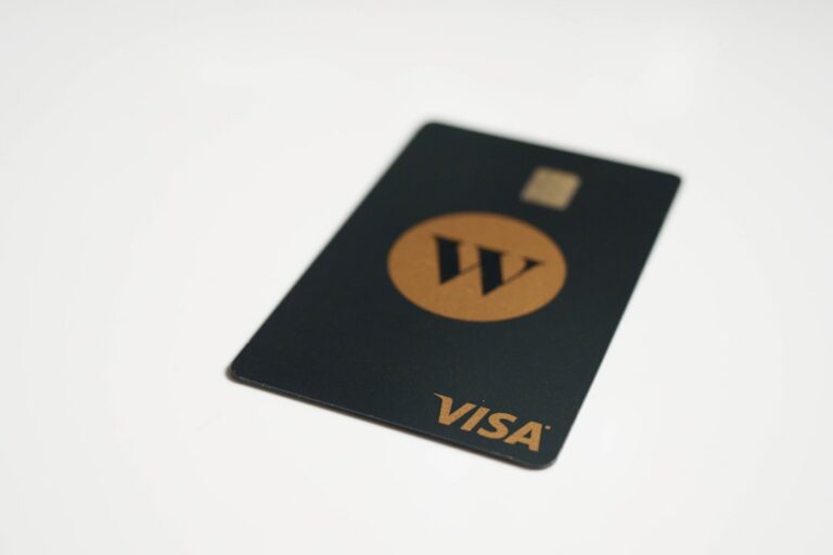 a visa card sitting on top of a white table