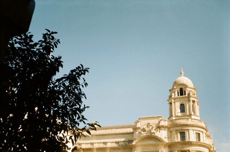 a large building with a clock on the top of it